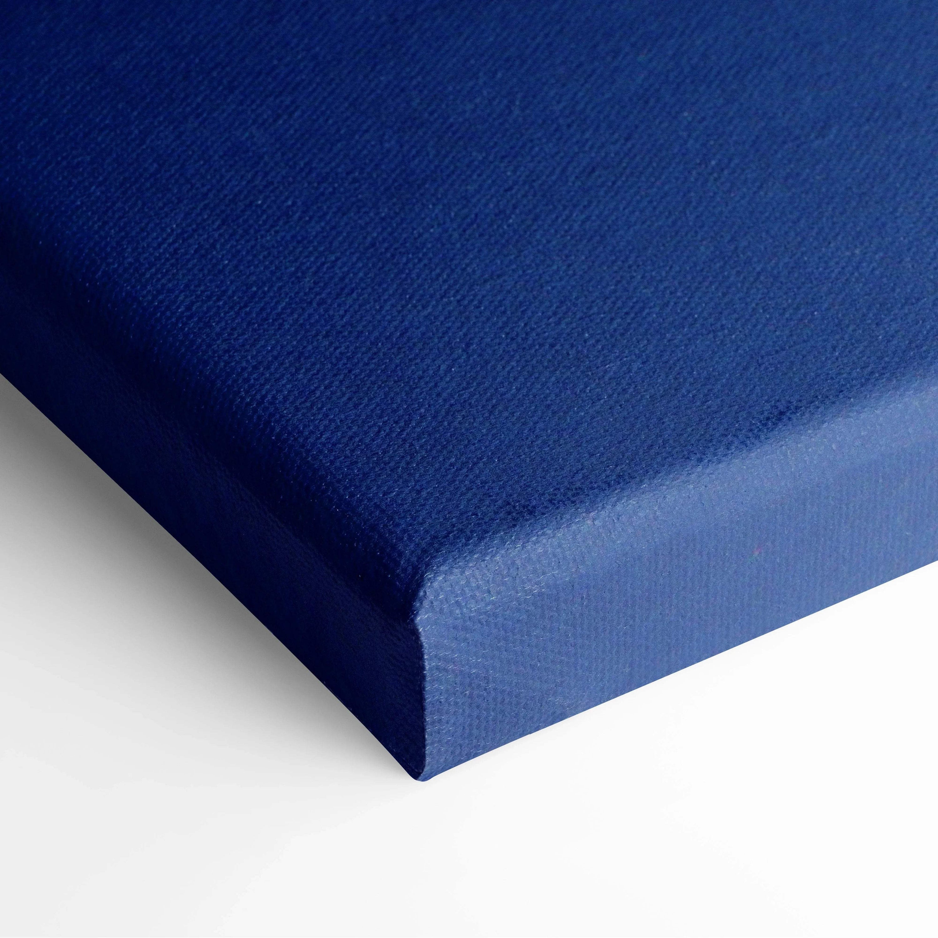 Modern minimalist canvas wall art in bold red blue black white, deep blue textured woven surface