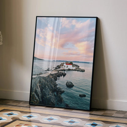 Vertical beach sunset landscape poster with rocky shore and house wall art.