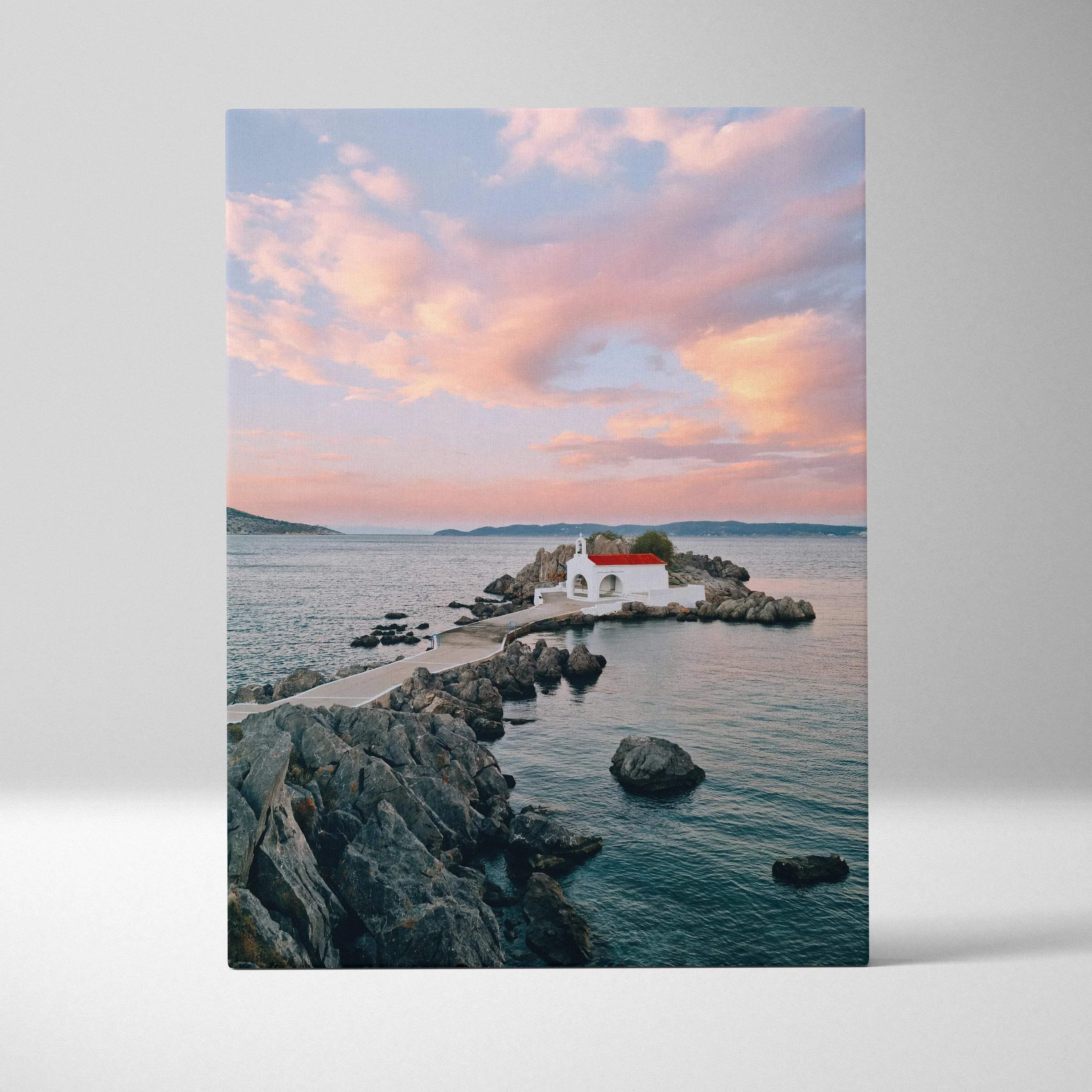 Canvas wall art featuring serene beach buildings under a pink and orange sunset sky.