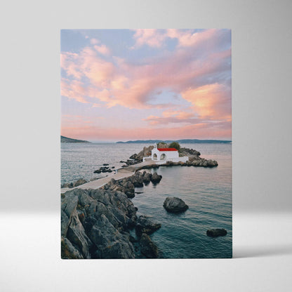 Canvas wall art featuring serene beach buildings under a pink and orange sunset sky.