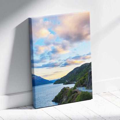 Mountain landscape canvas wall art with vivid sunset sky and serene lake view.