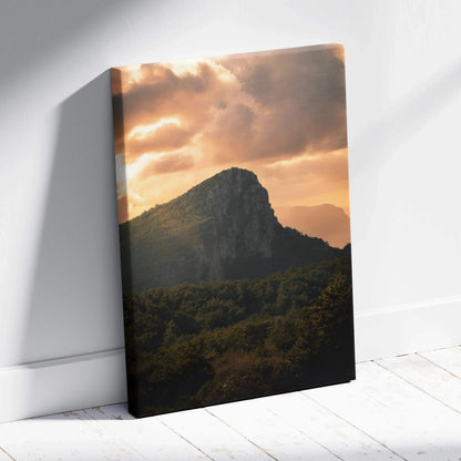 Canvas wall art featuring a majestic mountain silhouette under a dramatic sunset sky.