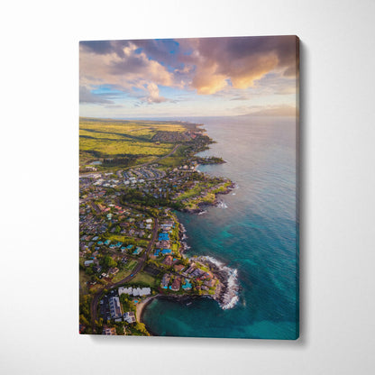 Vertical canvas wall art showing vibrant sunset over a coastal city skyline with beach and ocean.