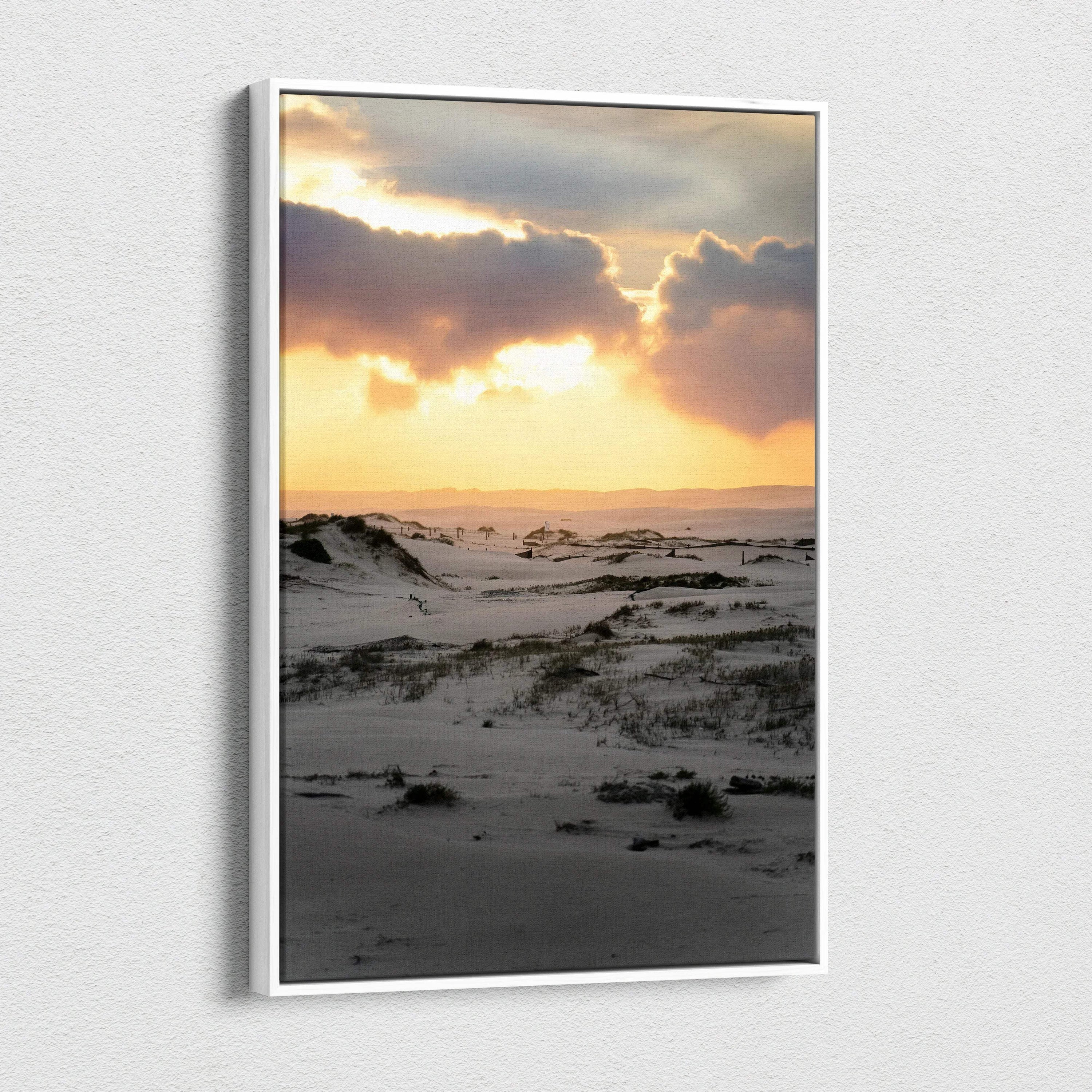 Snowy landscape at sunset with warm sky tones on vertical canvas wall art.