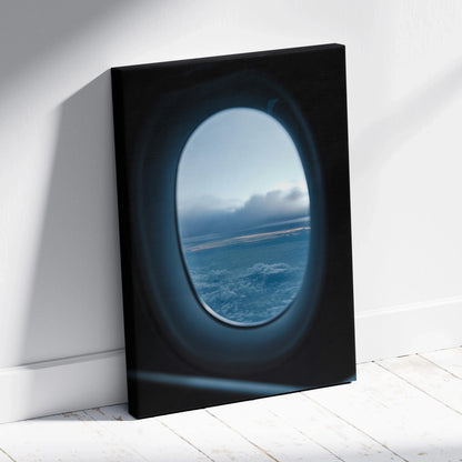 Canvas wall art featuring a serene airplane window view of clouds and horizon at dusk.