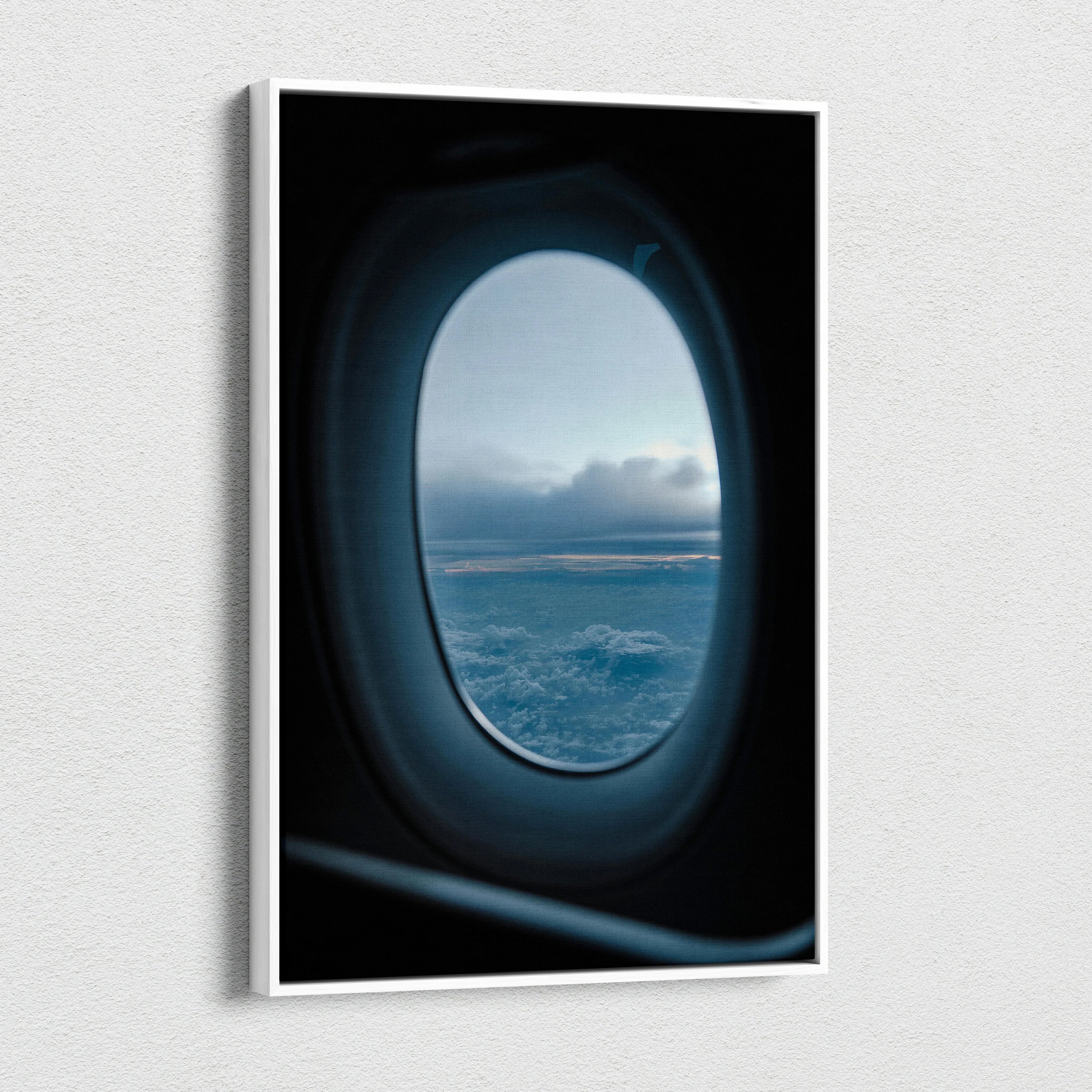 Canvas wall art showing a serene airplane window view of clouds and sky at dusk.