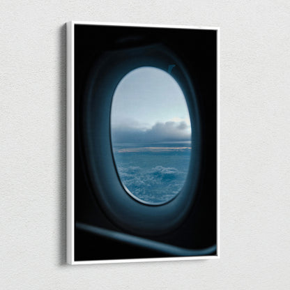 Canvas wall art showing a serene airplane window view of clouds and sky at dusk.