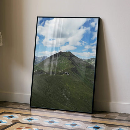 Vertical mountain landscape poster with green hills and blue cloudy sky wall art.