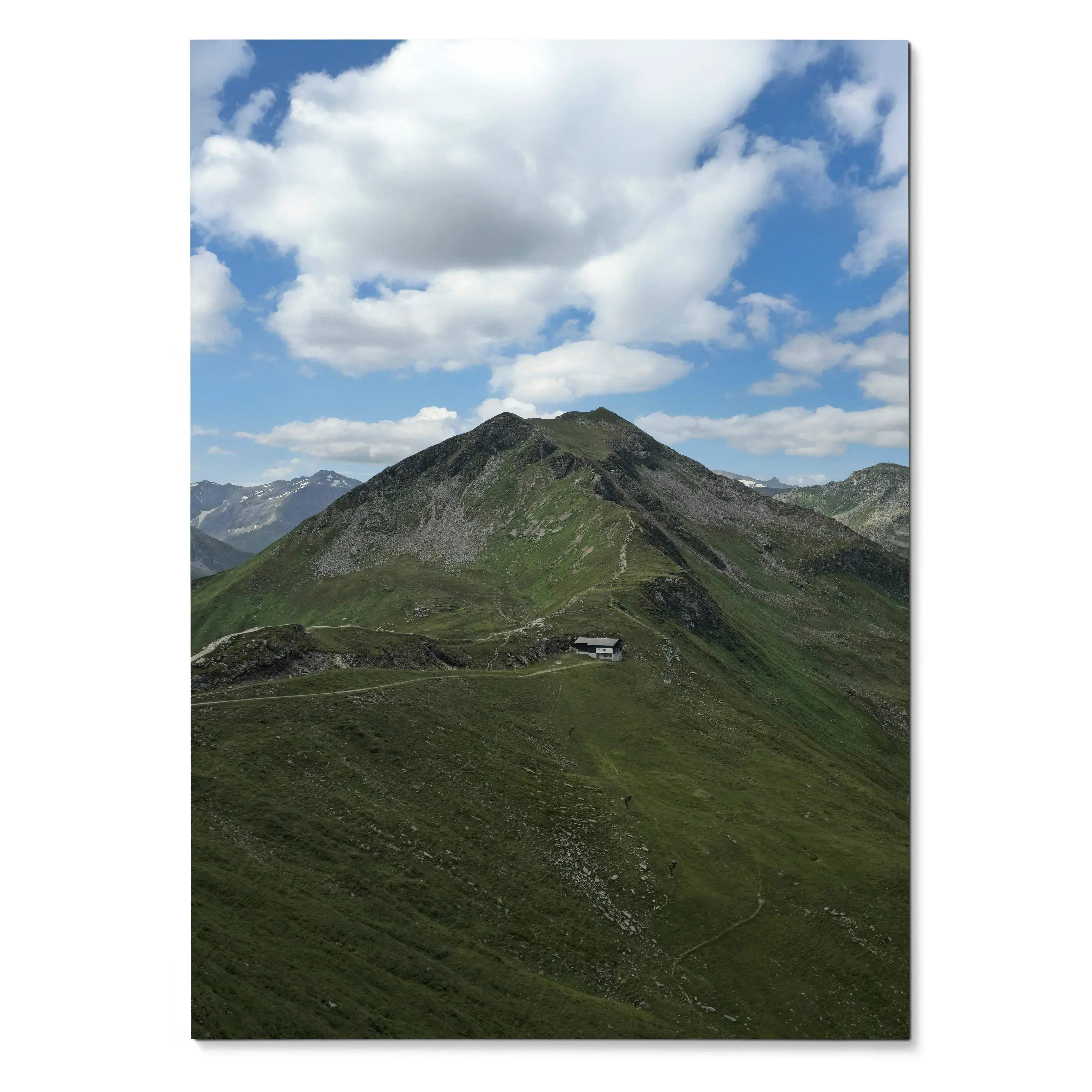 Vertical mountain landscape poster with green slopes under a partly cloudy blue sky wall art.