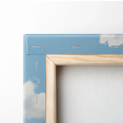 Blue canvas wall art showing a close-up of a wooden frame corner with visible staples and textured fabric.