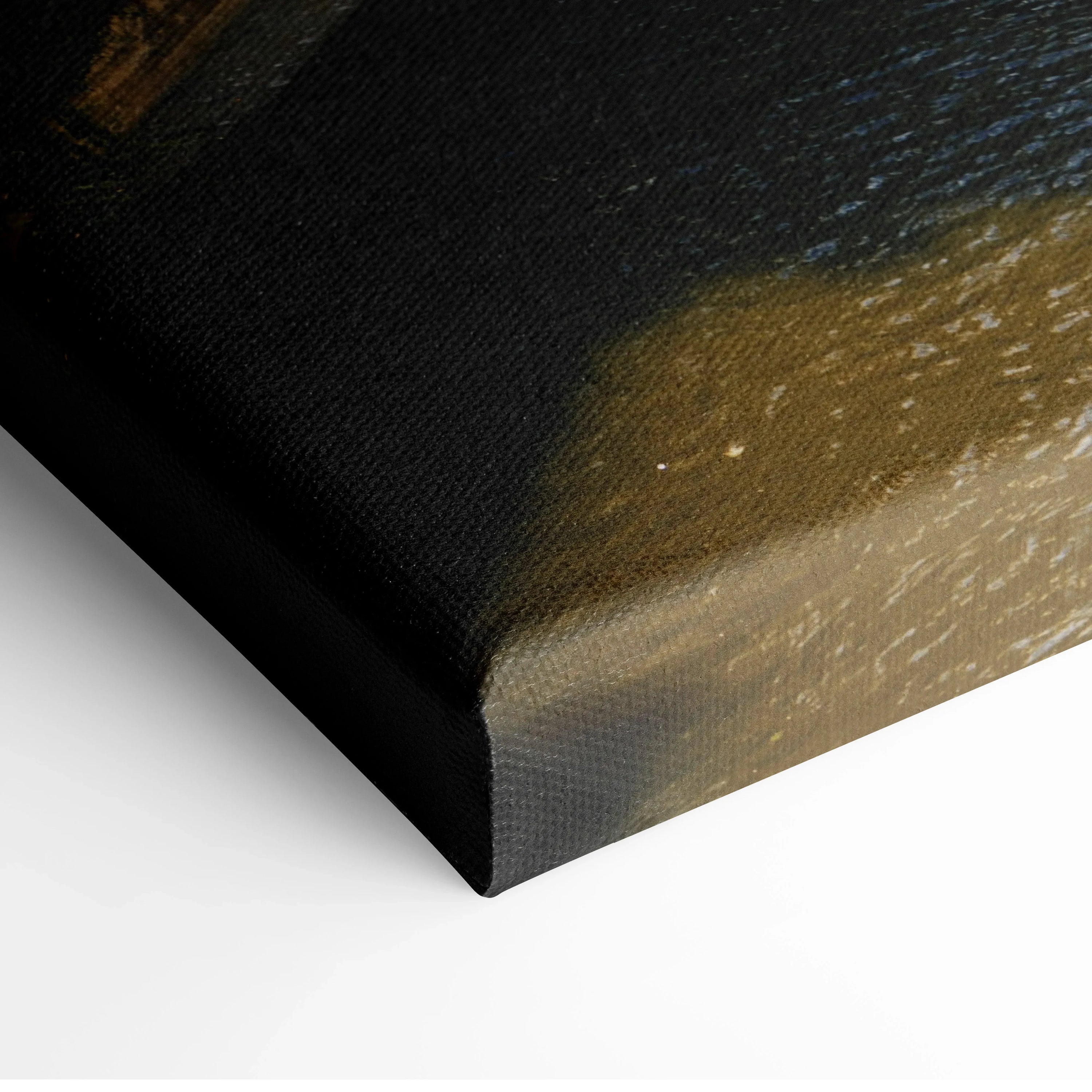 Close-up of textured canvas wall art corner with dark and golden urban skyline details.
