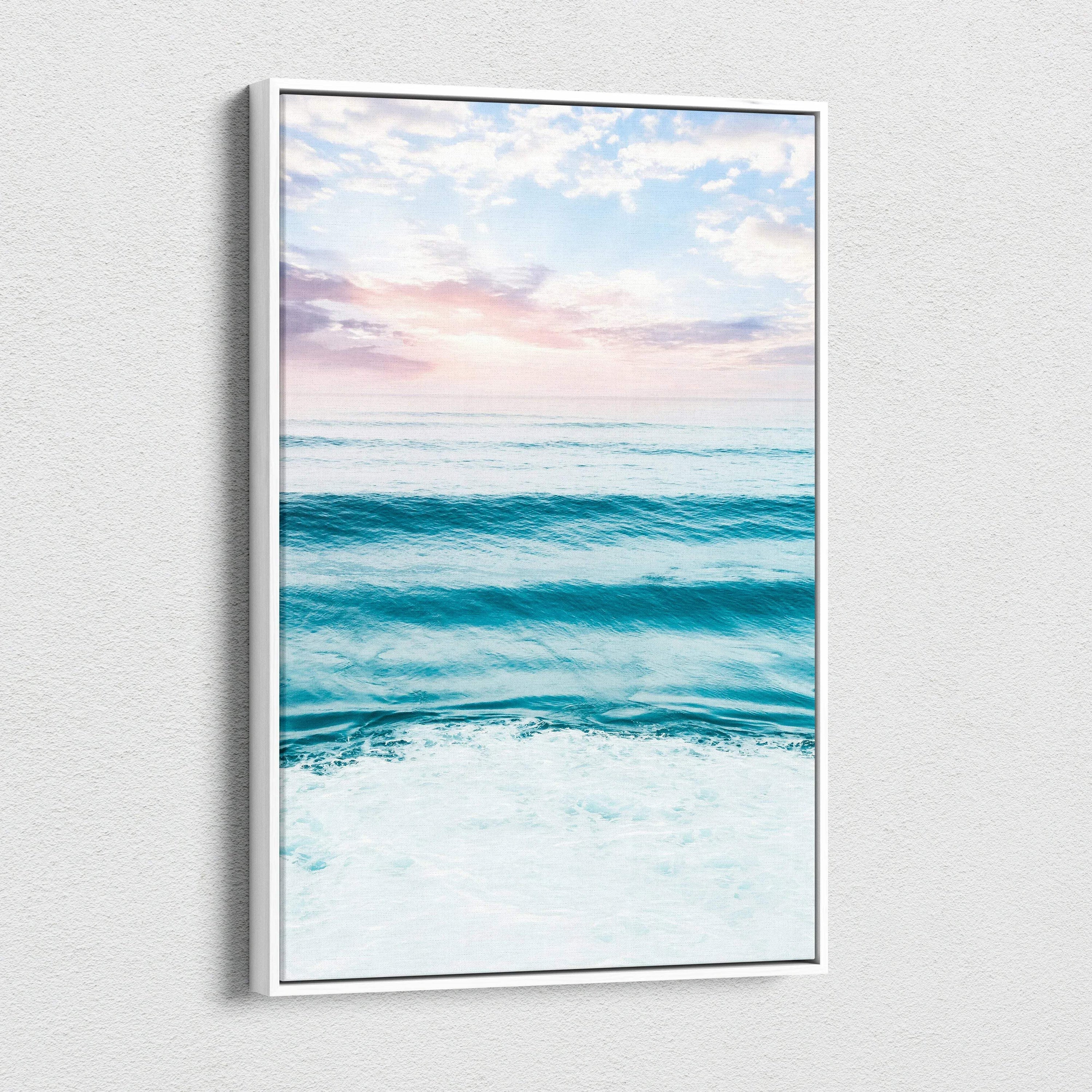 Beach sunset ocean waves with pastel sky on vertical canvas wall art.