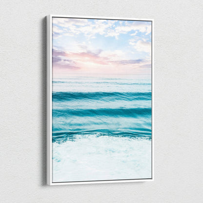 Beach sunset ocean waves with pastel sky on vertical canvas wall art.