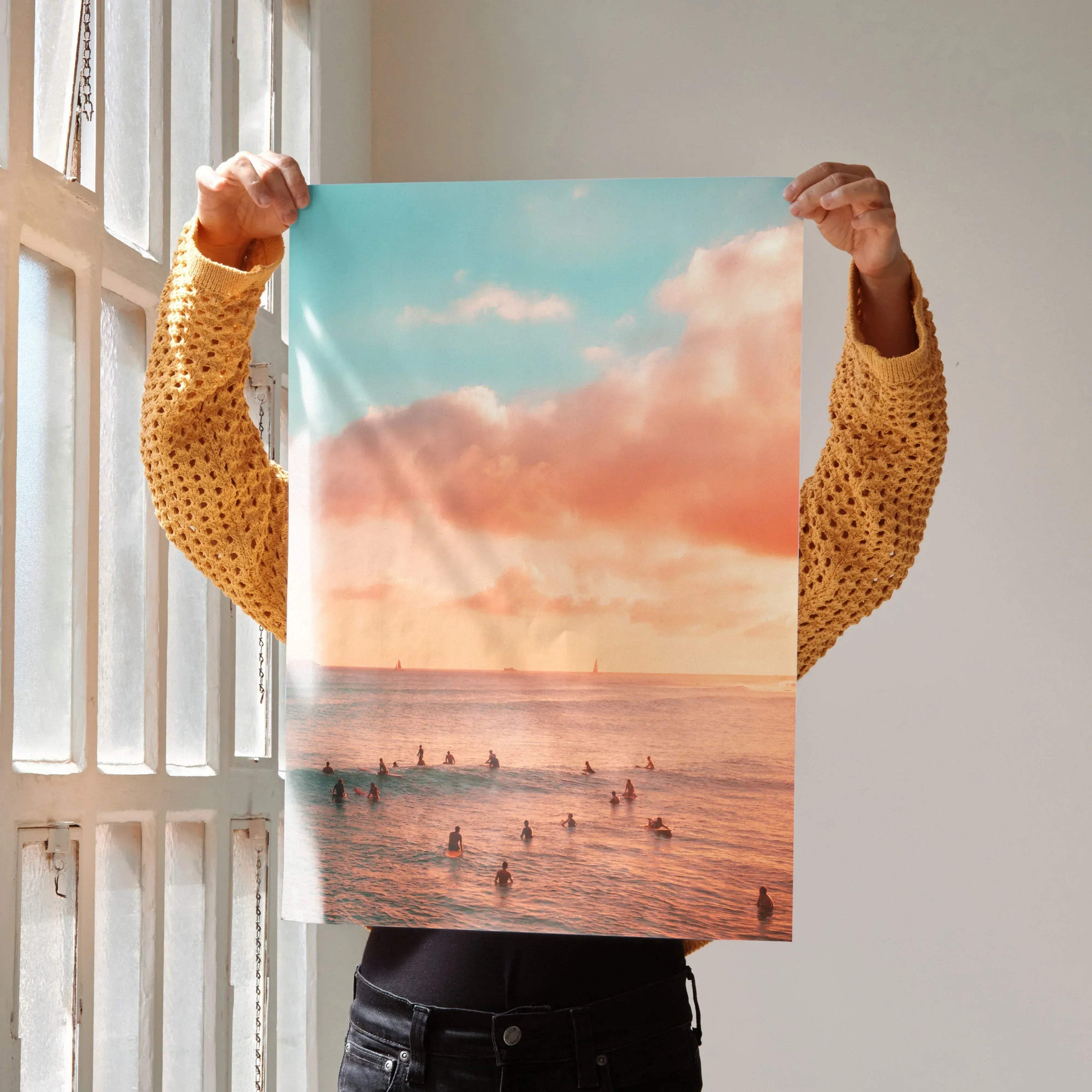 Vertical ocean sunset poster with warm orange sky and silhouetted surfers, wall art print.