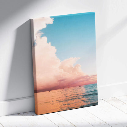 Ocean sunset beach scene with pink clouds and calm water on canvas wall art.