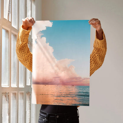 Ocean sunset poster with soft pink clouds and calm blue ocean wall art.