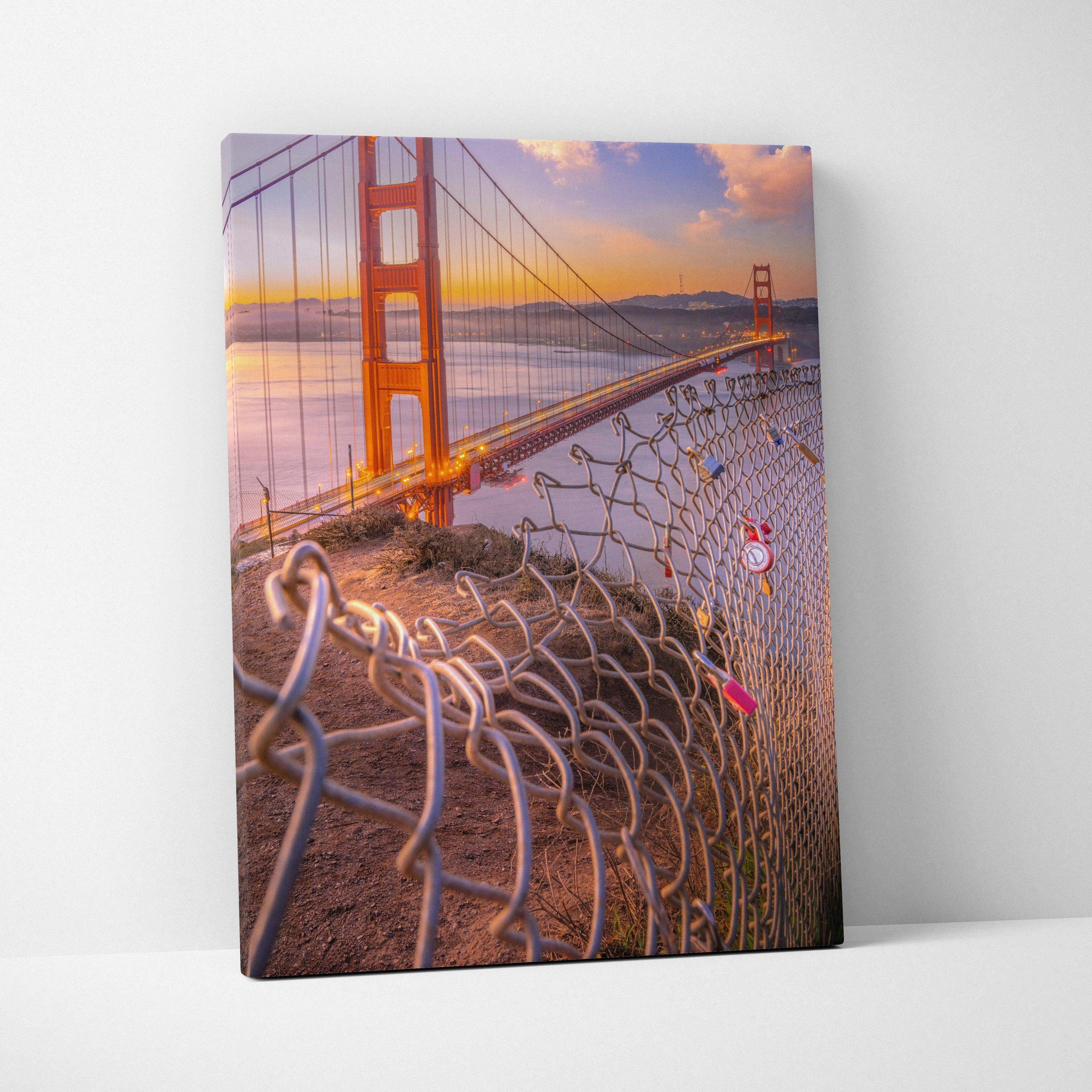 Golden Gate Bridge at sunset with chain-link fence foreground vibrant canvas wall art.