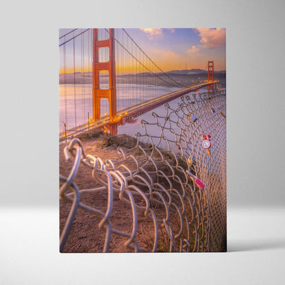 Golden Gate Bridge at sunset with chain-link fence foreground canvas wall art.