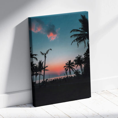 Ocean sunset with silhouetted palm trees on vertical canvas wall art print.