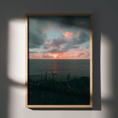 Vertical wall art poster of an ocean sunset beach with dramatic clouds and warm colors.