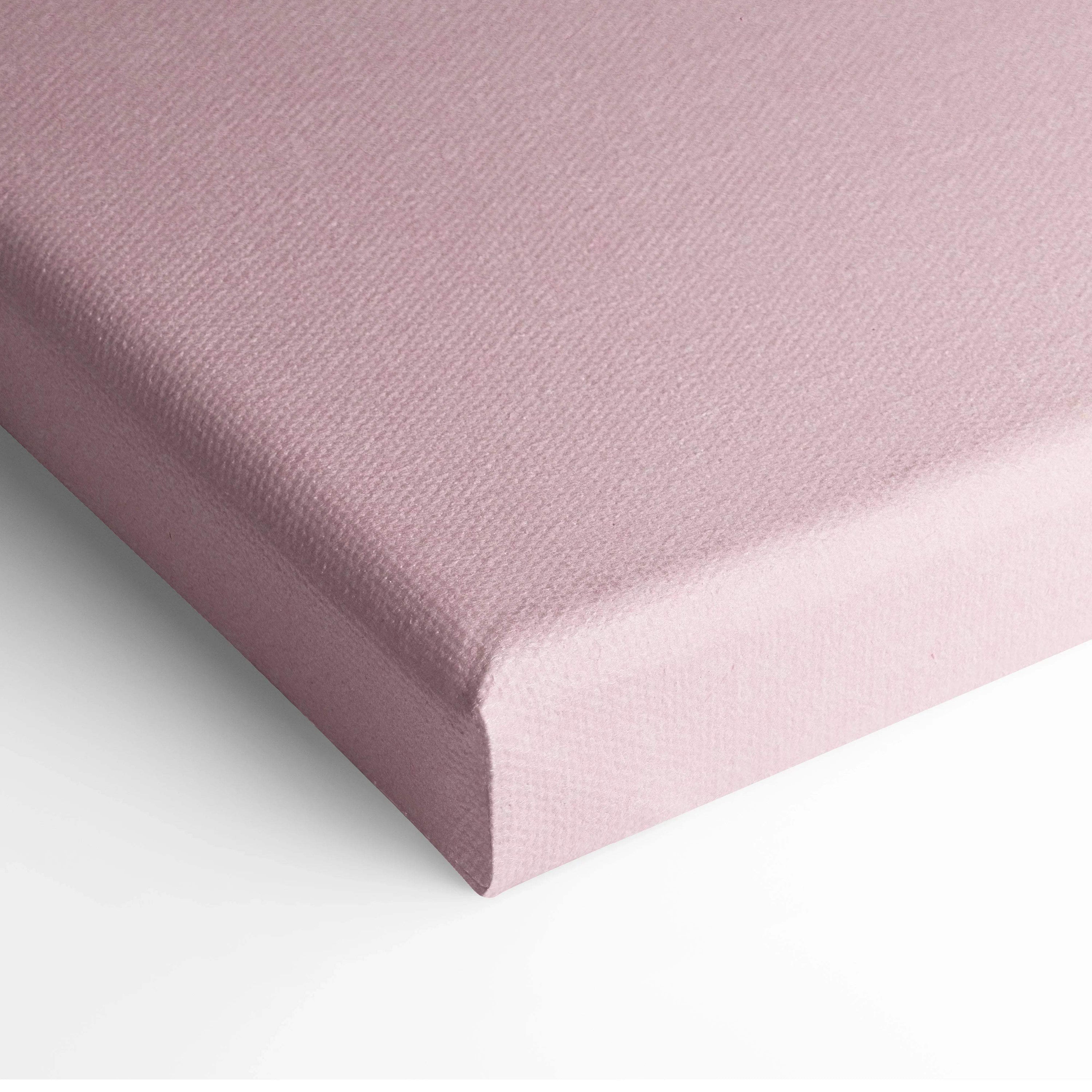 Minimal pink felt heart on textured pastel pink canvas wall art back