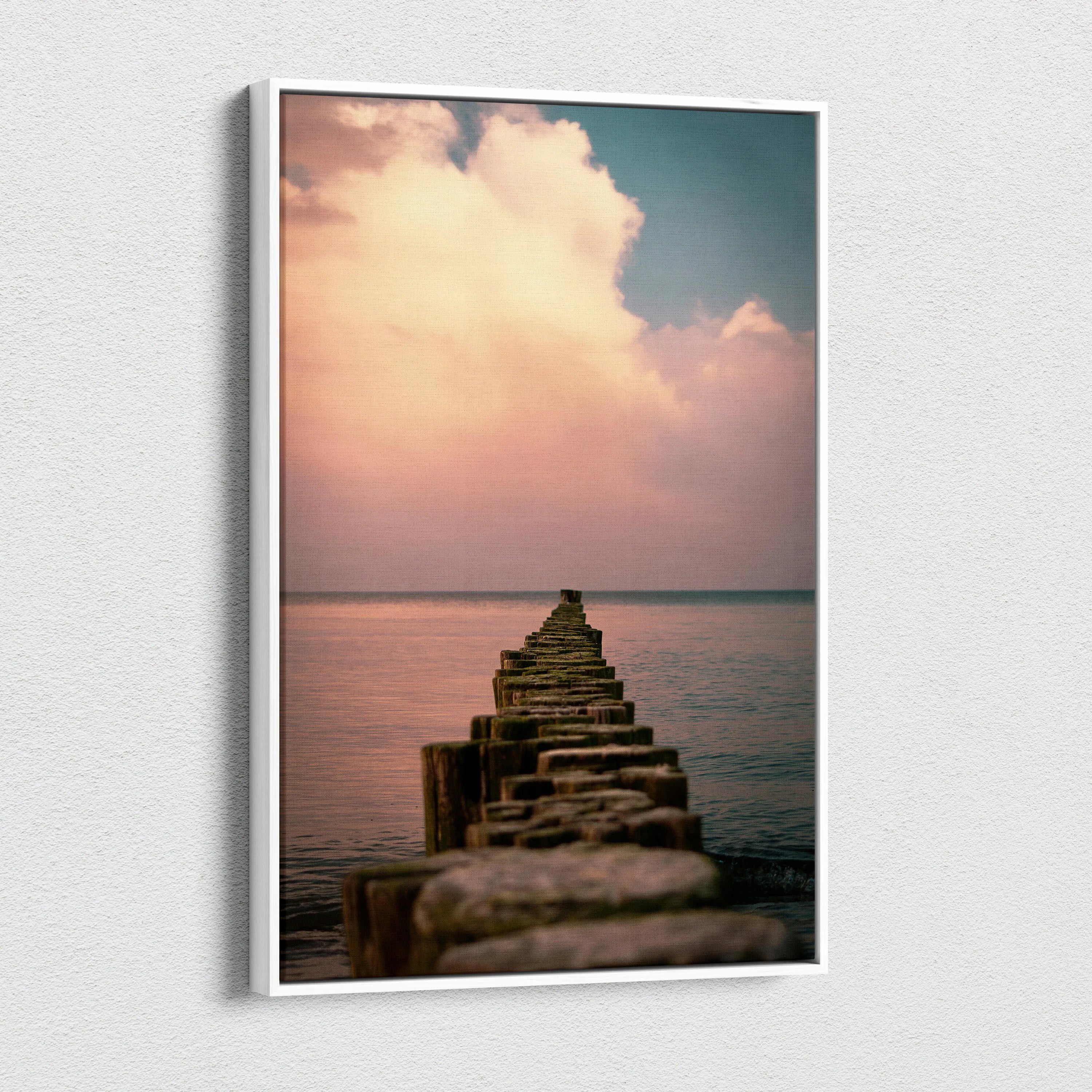 Vertical ocean sunset canvas wall art with wooden pier leading into calm water under pastel sky.