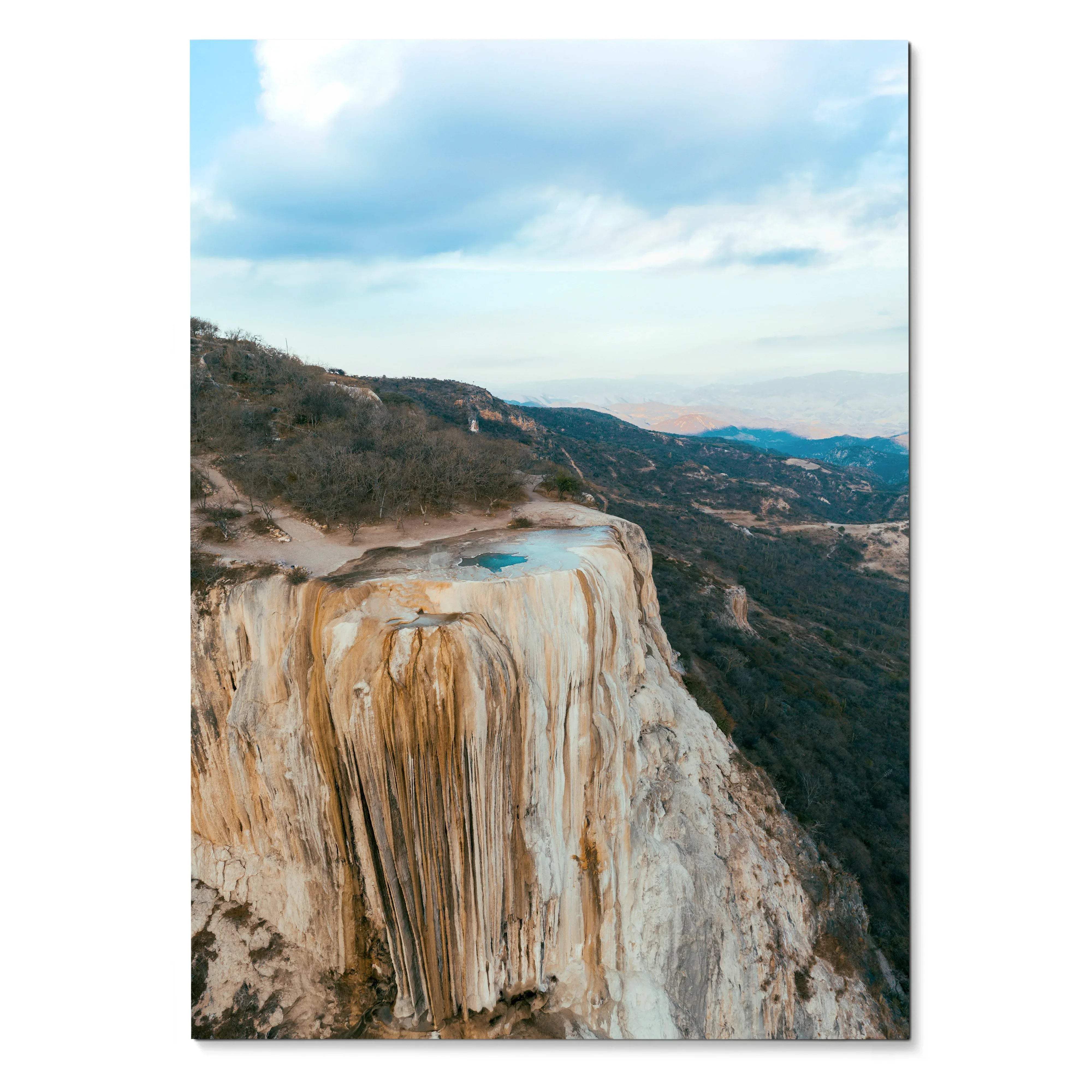 Majestic mountain landscape poster featuring a vertical view of rocky cliffs and a bright blue sky wall art.