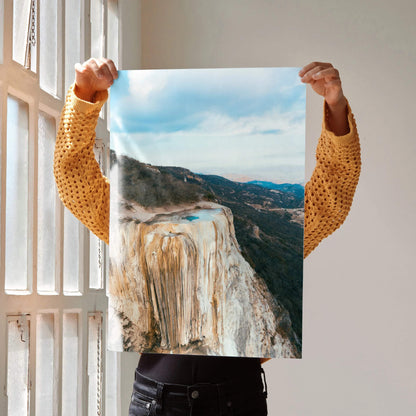 Majestic mountain landscape poster with rocky cliffs and cloudy blue sky wall art.