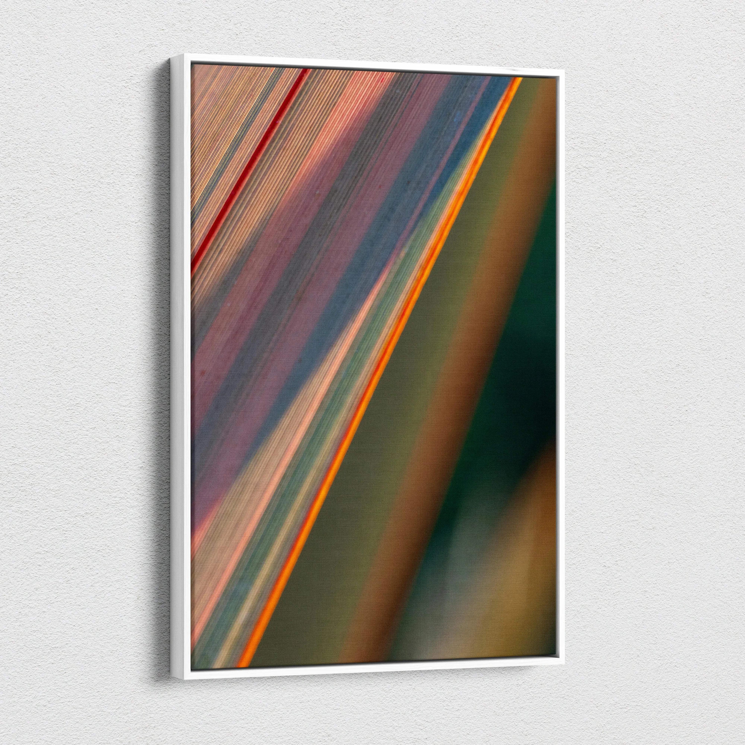 Abstract macro leaf canvas art in white frame with teal coral gold green stripes
