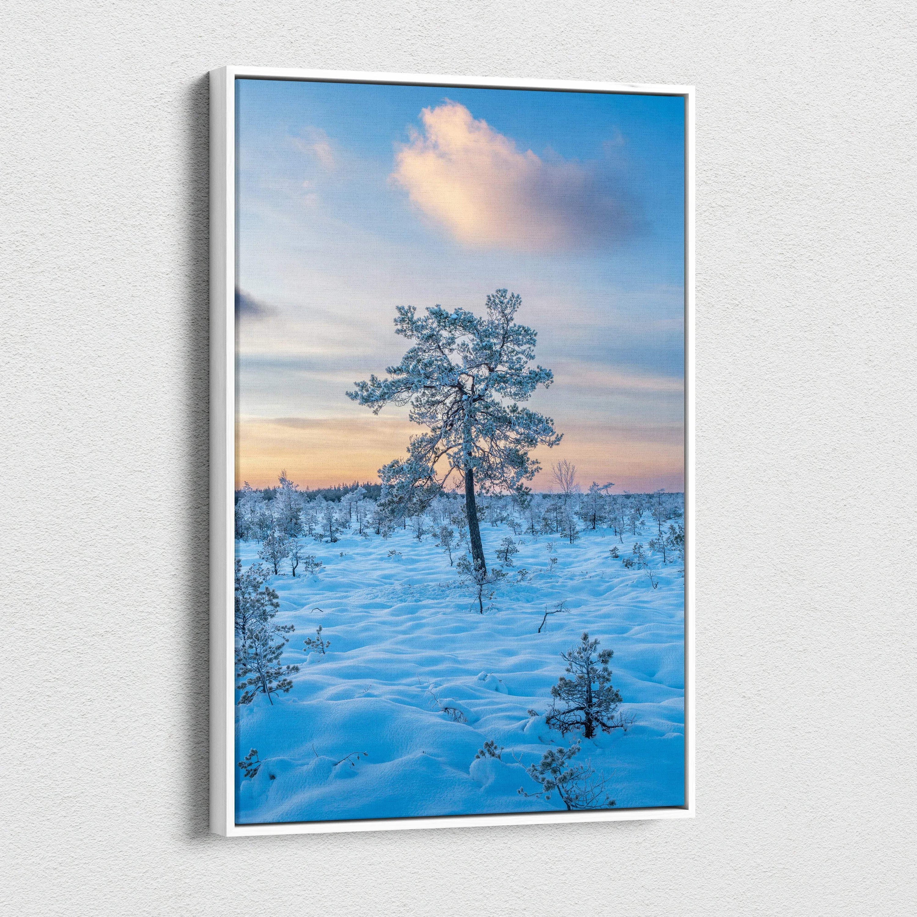 Vertical snowy landscape canvas wall art with lone tree at sunset sky.