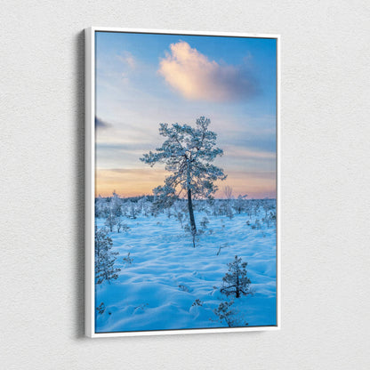 Vertical snowy landscape canvas wall art with lone tree at sunset sky.