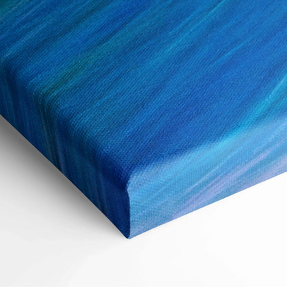 Abstract blue gradient canvas painting with diagonal streaks in purple, pink, gold