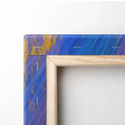 Blue and gold abstract motion blur canvas in light wood frame