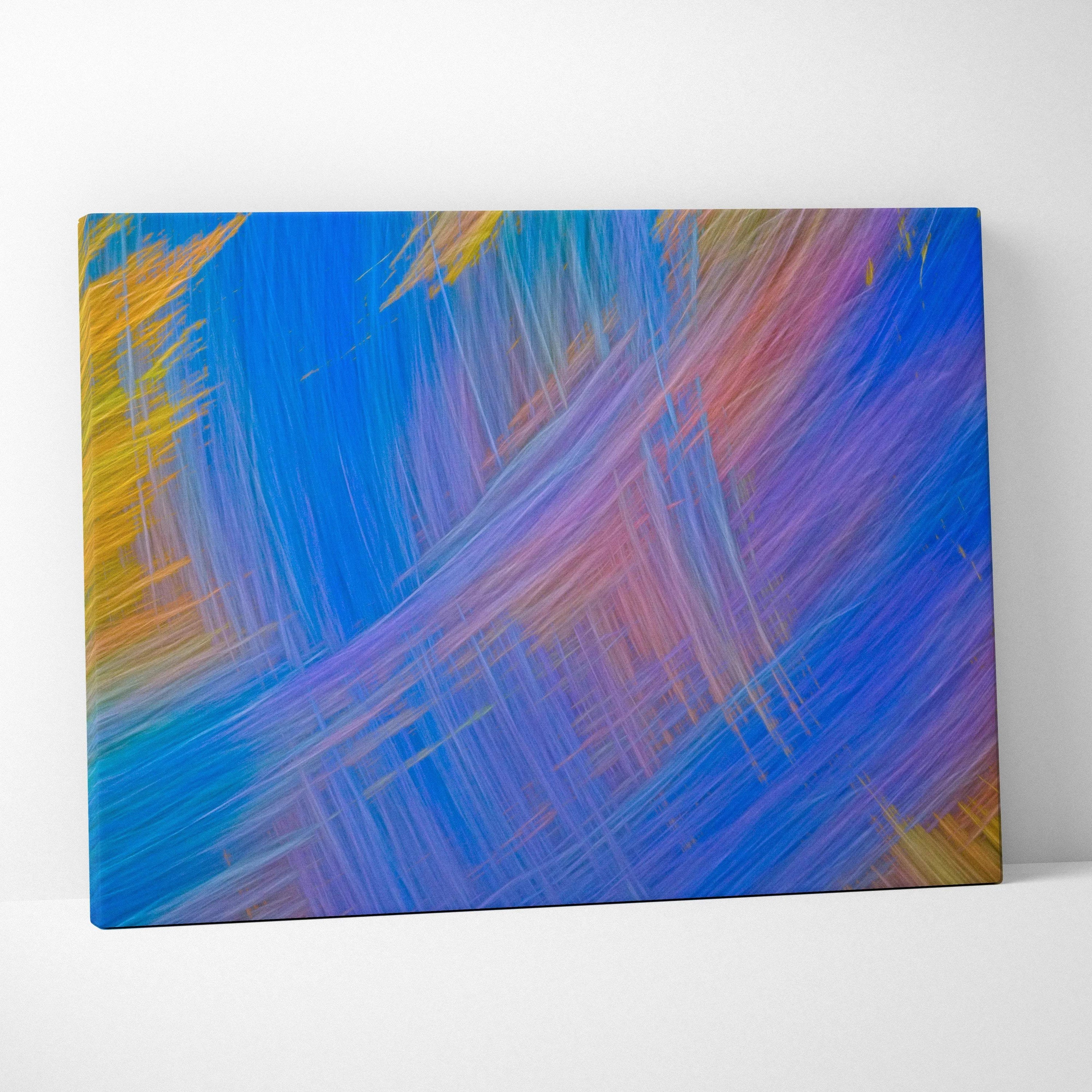 Vibrant abstract motion blur canvas wall art with diagonal streaks in blue, purple, pink, gold