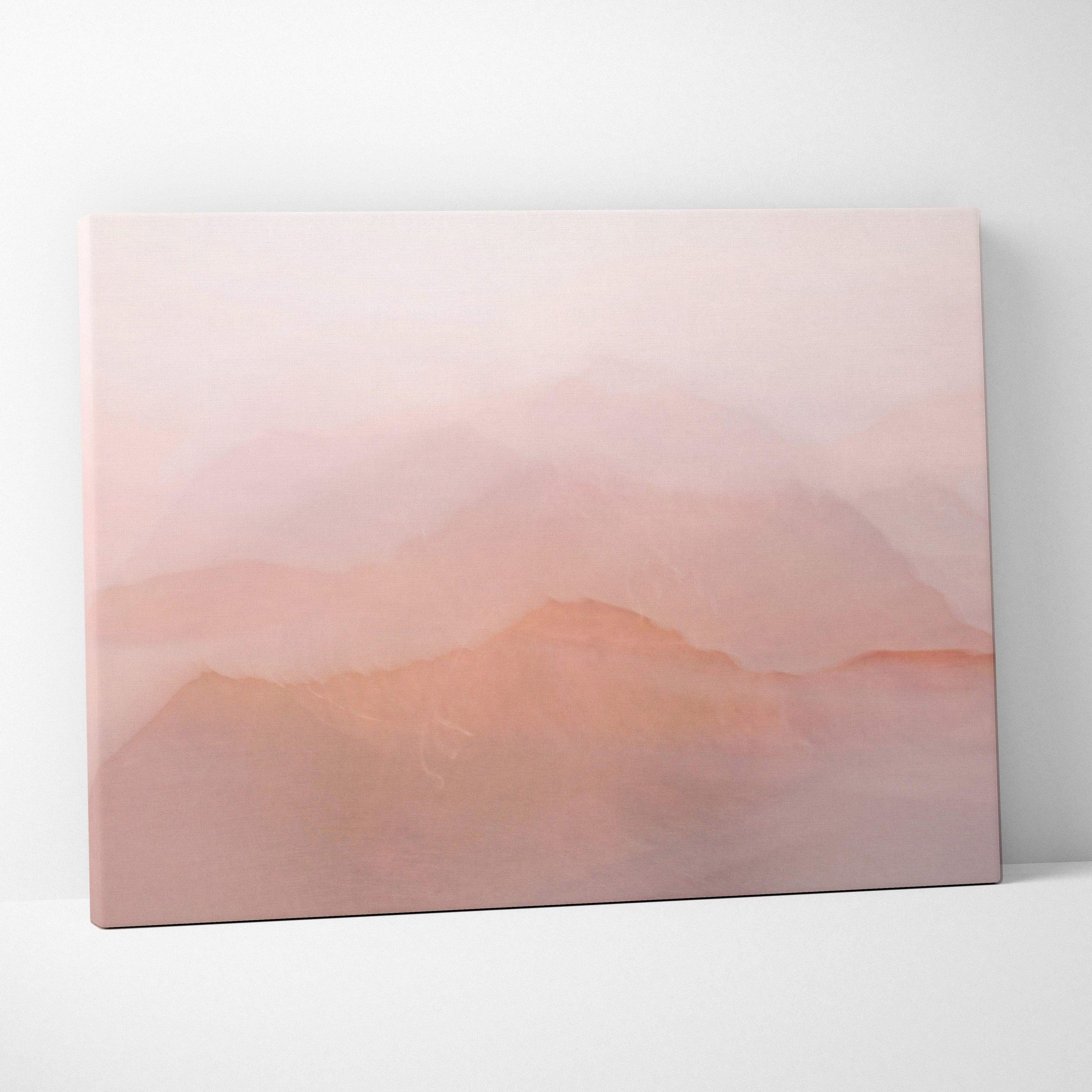 Soft pink gradient canvas print with misty layered mountain silhouettes