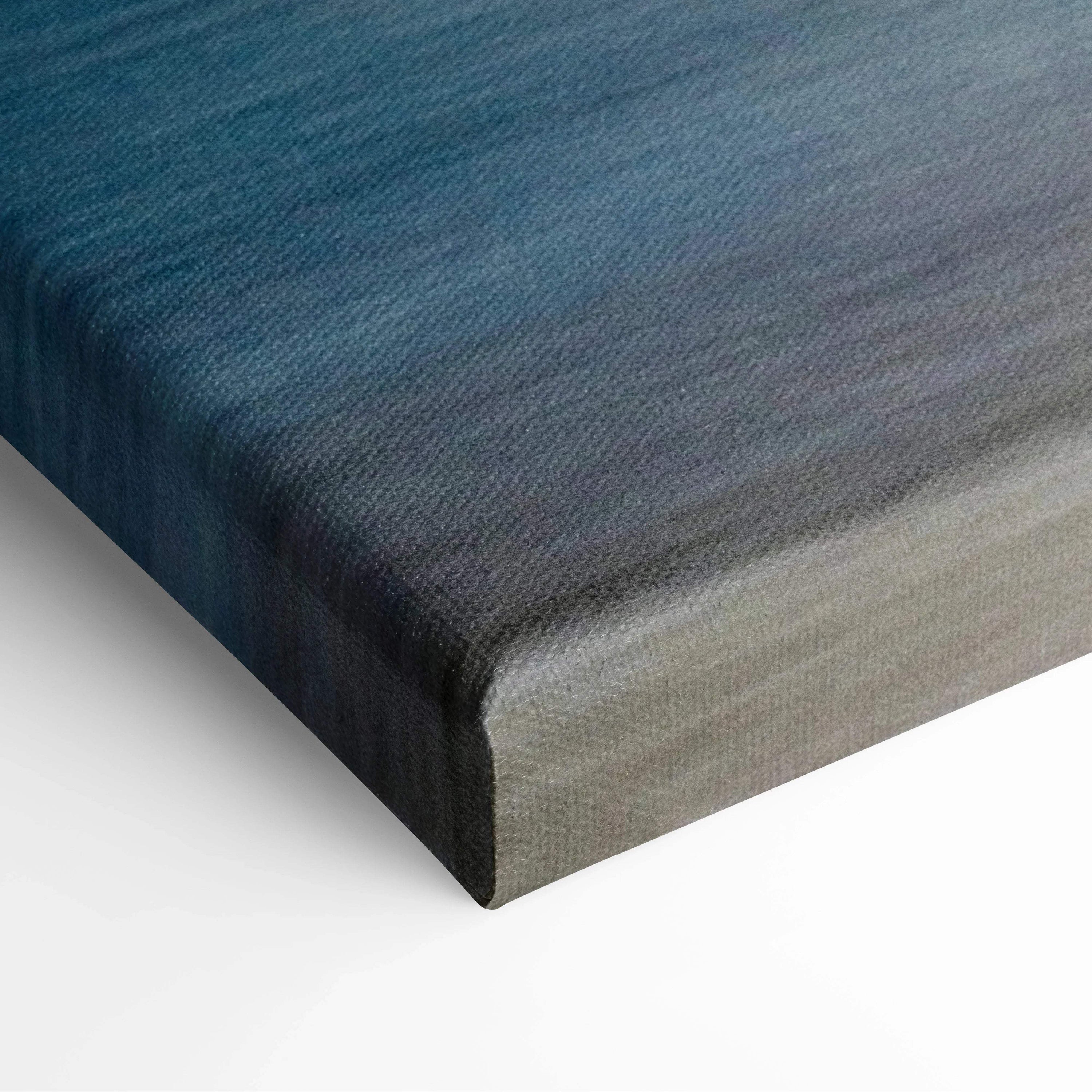 Moody abstract seascape canvas art with dark island silhouette and blue gradient texture