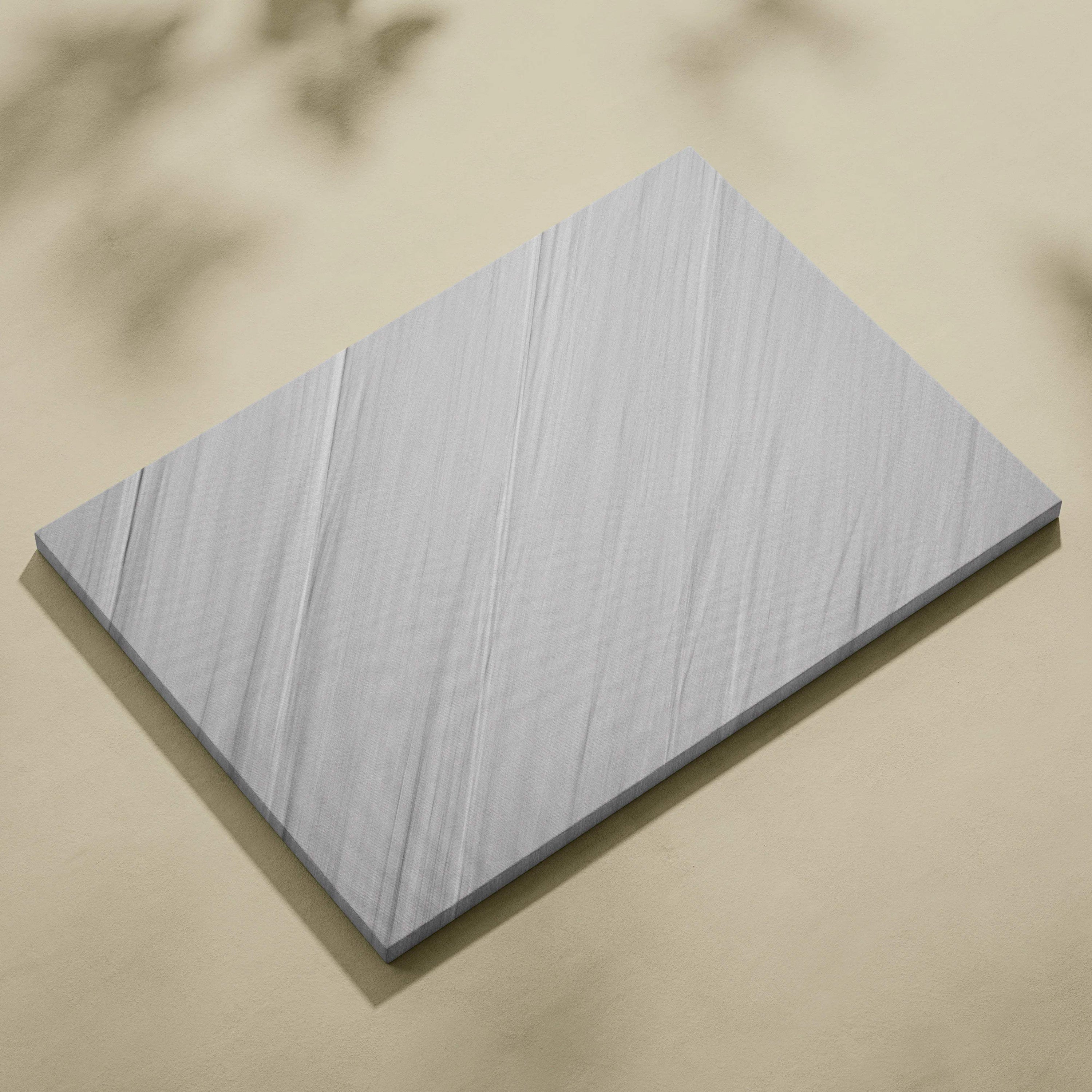 Gray rectangular tile with subtle white veining in minimalist silver gray canvas art
