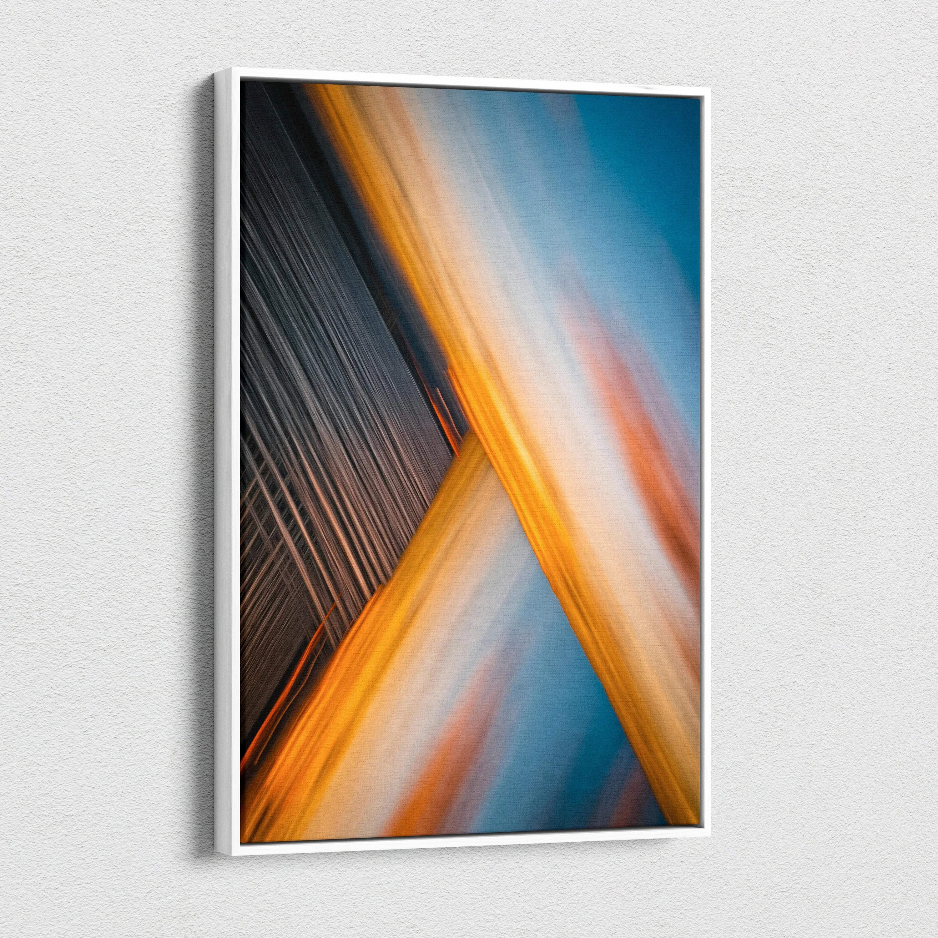 Abstract city skyline motion blur sunset art in gold orange deep blue tones framed