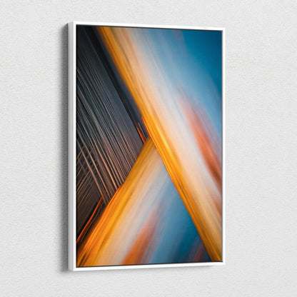Abstract city skyline motion blur sunset art in gold orange deep blue tones framed
