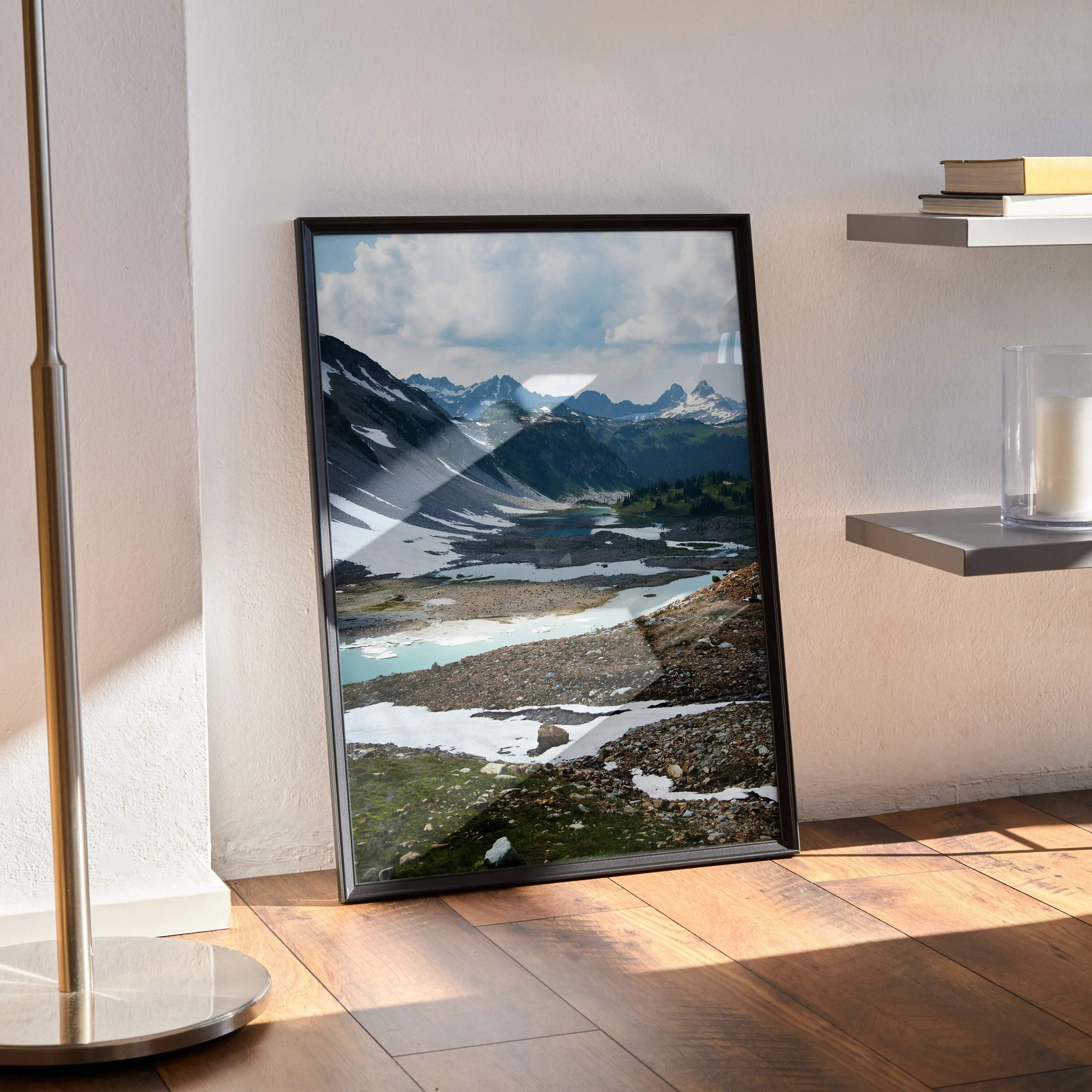 Majestic mountain landscape poster with snowy peaks and rocky foreground in black frame wall art.