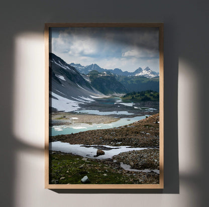 Majestic mountain landscape wall art poster with snowy peaks and reflective alpine lakes in vertical frame.