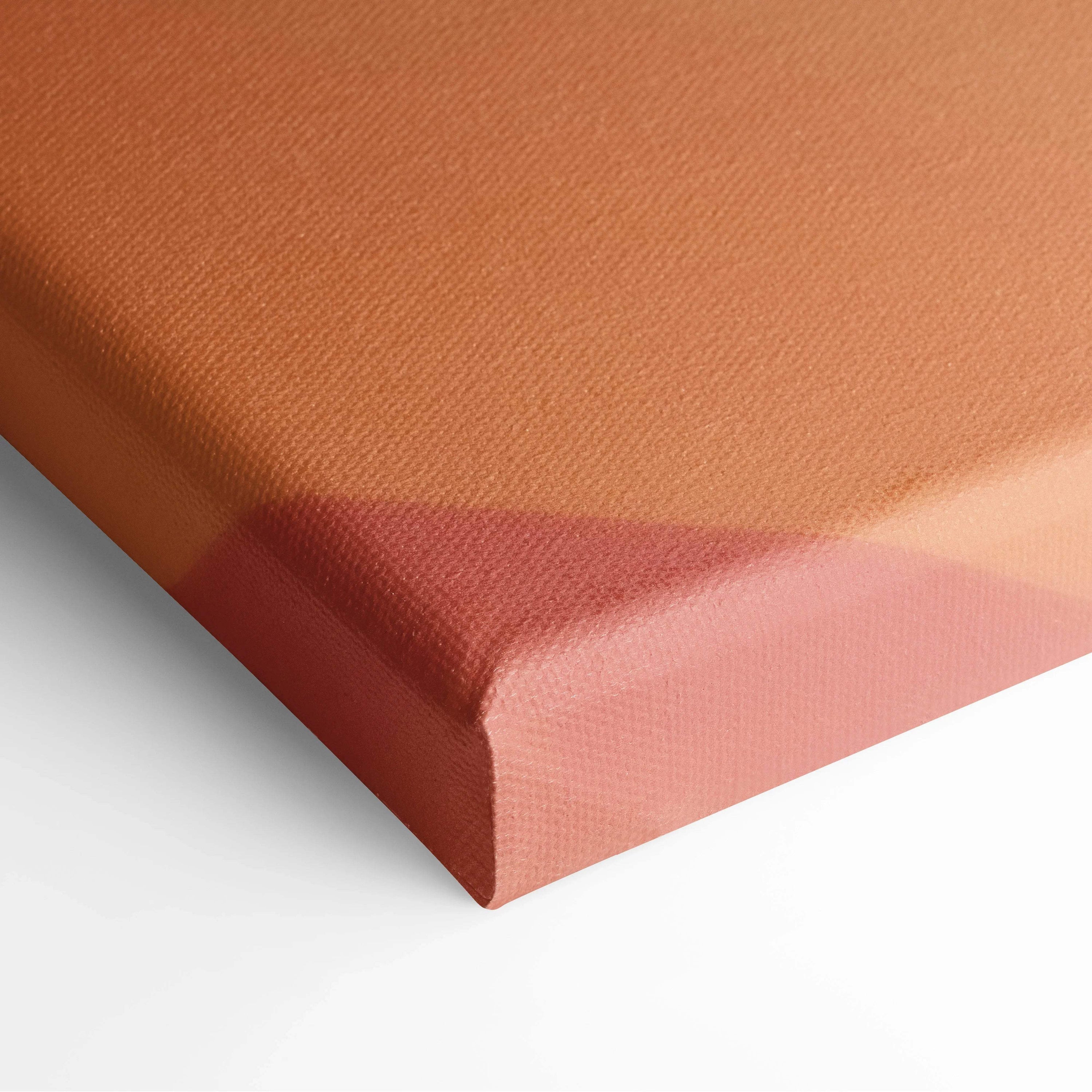 Textured rust-orange gradient canvas print with visible weave in coral peach tones
