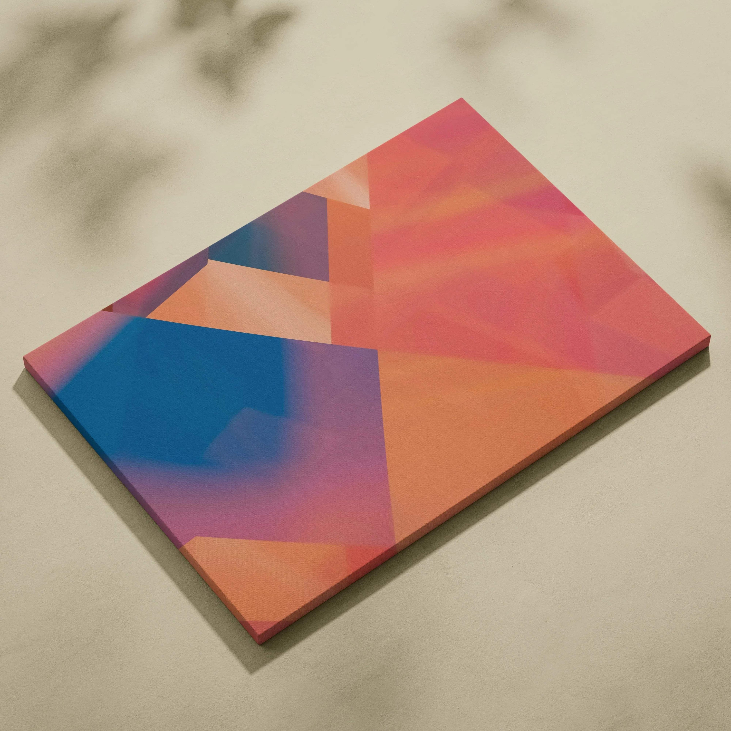 Geometric polygon canvas wall art in coral peach pink and deep blue