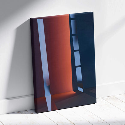 Modern abstract canvas with bold orange, navy stripes on white wall
