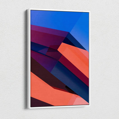 Bold abstract geometric canvas wall art in blue navy coral red tones, framed