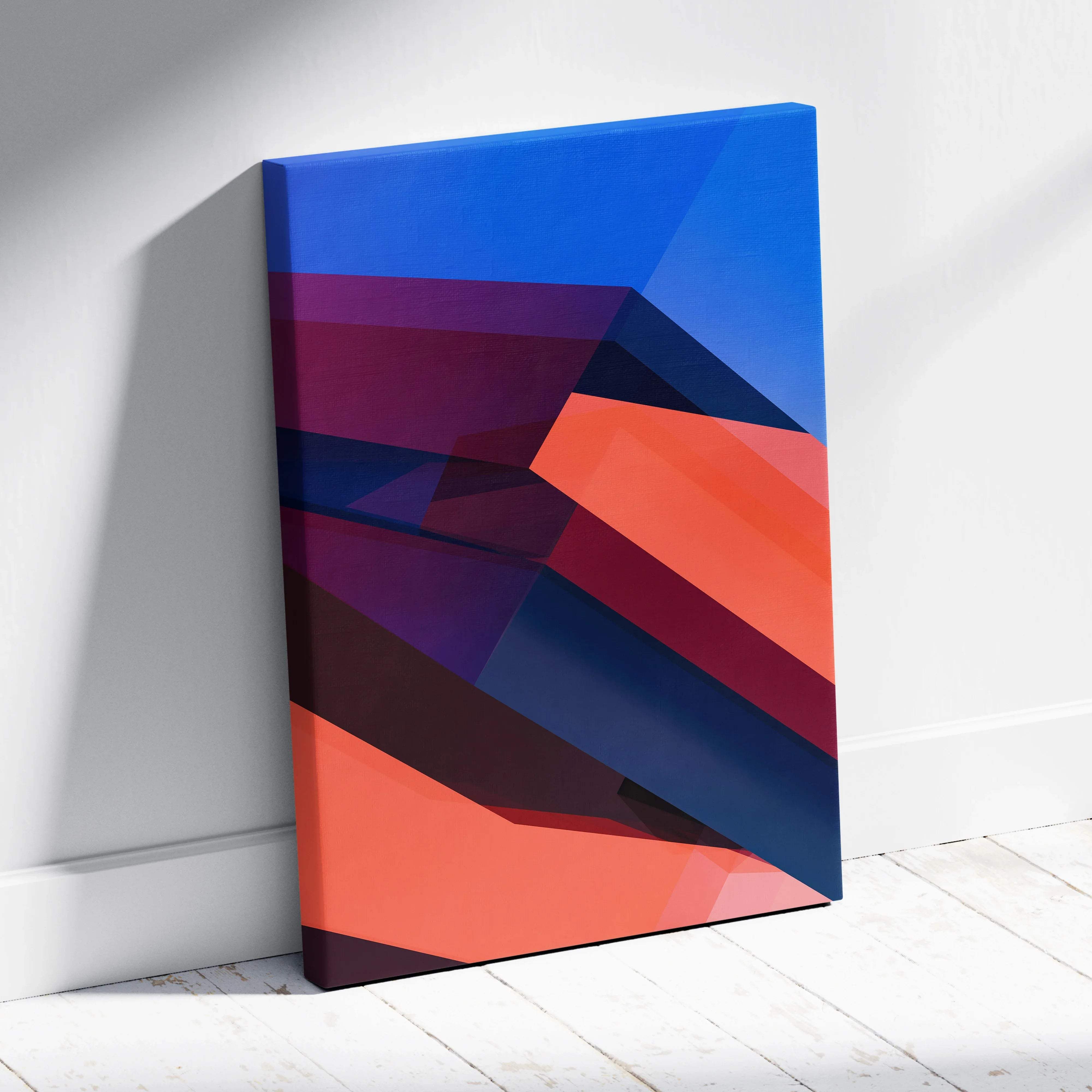 Bold abstract geometric canvas wall art with layered diagonal shapes in blue navy coral red tones