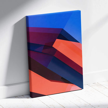 Bold abstract geometric canvas wall art with layered diagonal shapes in blue navy coral red tones