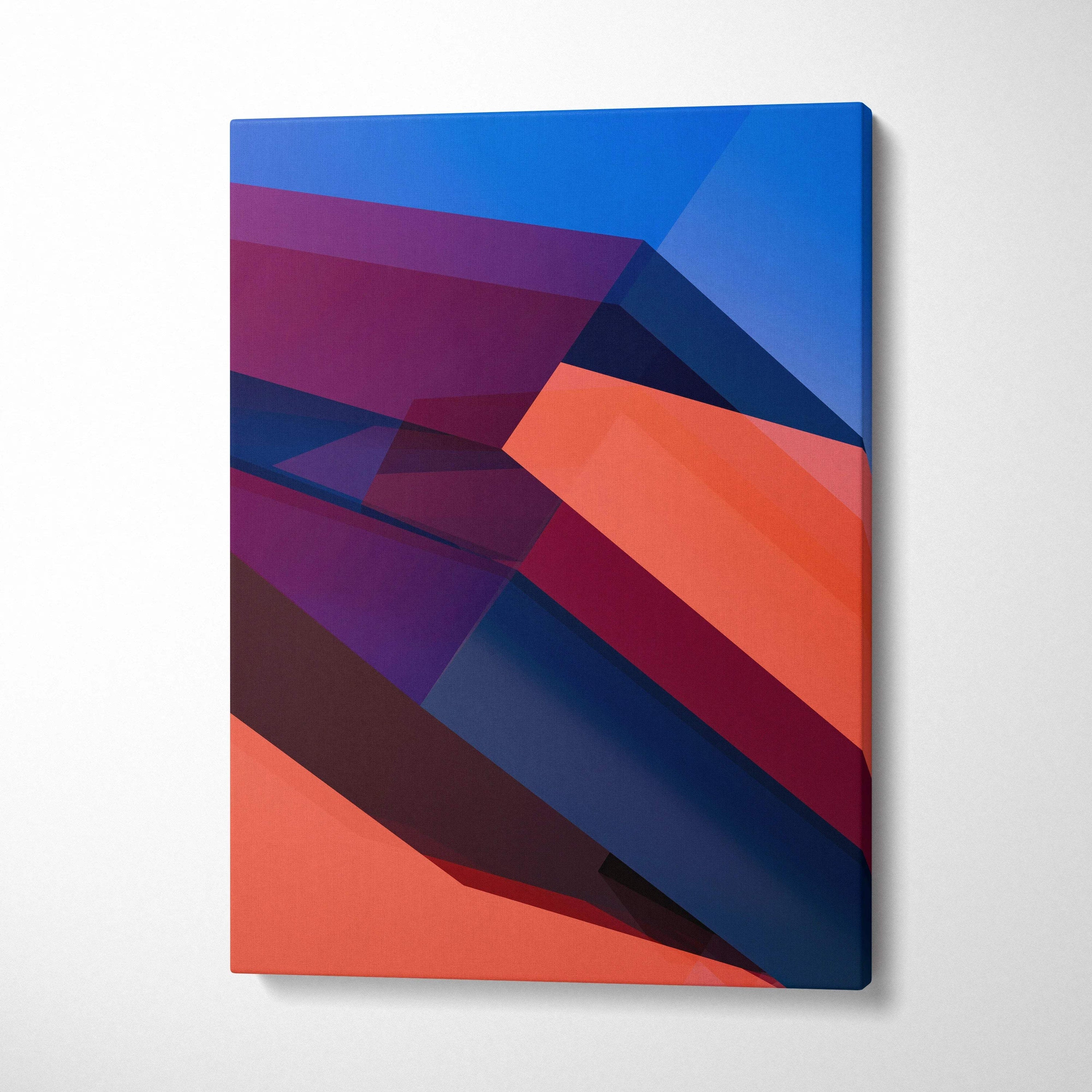Bold geometric canvas wall art with layered diagonal shapes in blue navy coral red tones