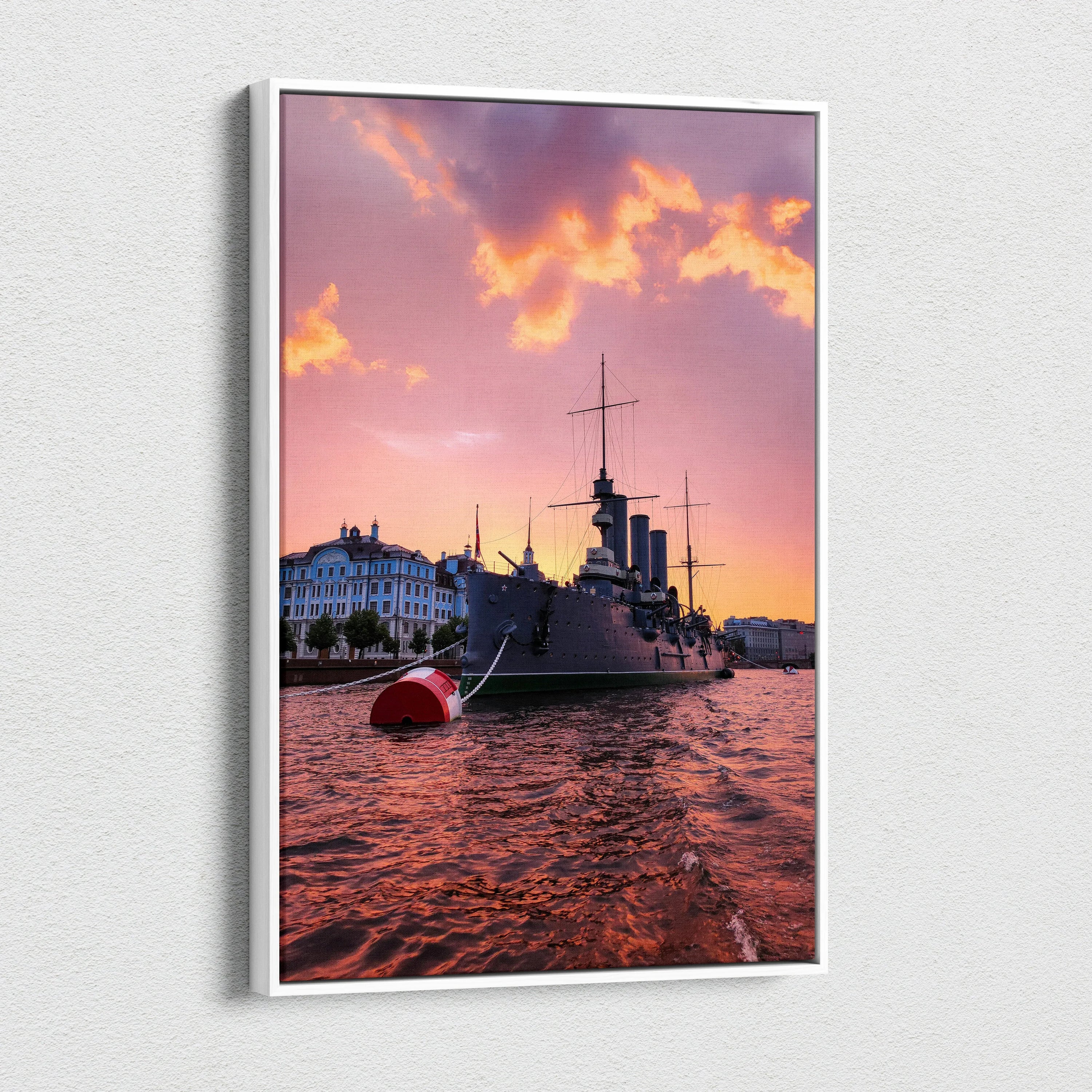 Canvas wall art of a city harbor at sunset with ship silhouette and vibrant orange sky.