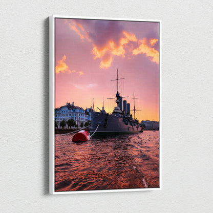 Canvas wall art of a city harbor at sunset with ship silhouette and vibrant orange sky.